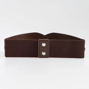 Detail of coffee brown wide elastic waist belt with silver metal double snap buttons