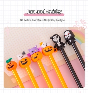 Detail of Halloween silicone pen toppers featuring pumpkin, ghost, and cat 3D designs