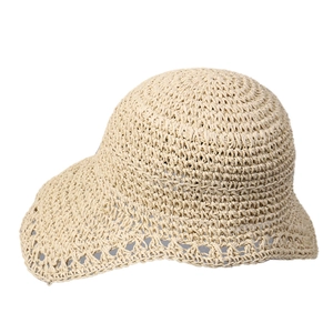 Handwoven beige straw sun hat with wavy crochet edges and foldable summer design