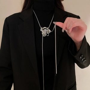 Chic silver liquid flower pendant necklace with adjustable long snake chain on model