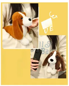 Detail of plush dachshund dog toy featuring soft brown and white fur with floppy ears