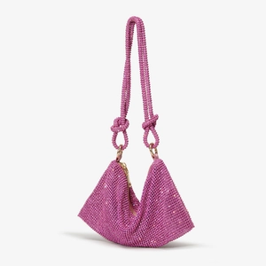 Close-up of pink rhinestone triangle handbag with beaded handle and knot detail