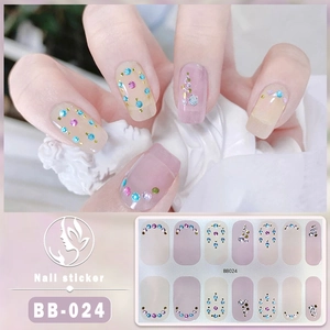 Detailed view of 5D gel nail stickers with 3D gold stamping and rhinestones, model BB-024