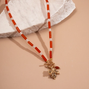 Retro beaded necklace with orange glass beads and golden maple leaf pendant with OT clasp