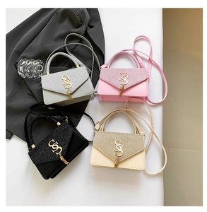 Chic shoulder bags in four colors featuring sequined flaps and metal tassel accents