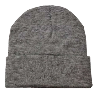 Close-up of gray knitted beanie showing fine texture and fold-over cuff detail