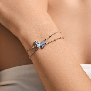 Elegant S925 silver double-layer bracelet with a blue crystal butterfly pendant for women