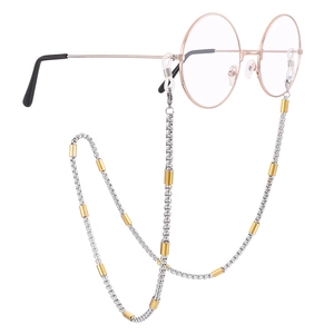 Silver stainless steel eyeglass chain with gold accents and anti-slip rubber loops