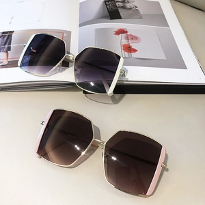 Detailed view of square gradient lens sunglasses with stylish metal and plastic frames