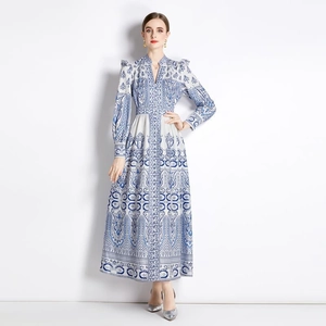 Elegant vintage V-neck maxi dress with blue and white floral prints and lantern sleeves