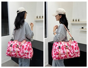 Spacious pink and red leopard print gym bag for travel with adjustable shoulder strap