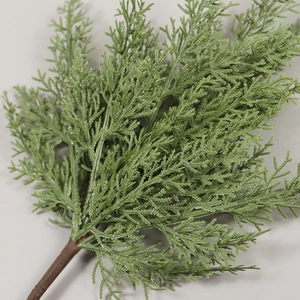 Artificial pine branches with realistic green needles for Christmas floral decorations