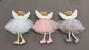 Detail of three angel Christmas tree ornaments in white, pink and grey with tulle skirts