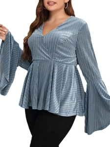 Plus size light blue V-neck top with bell sleeves and metallic wavy texture fabric