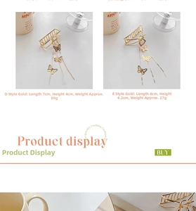 Detail of golden butterfly hair claws with elegant tassel chains and pearl accents