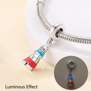 Luminous lighthouse charm bead in silver finish for DIY bracelets with night glow effect