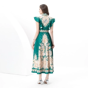 Green bohemian maxi dress with vintage gold floral patterns and flutter sleeves