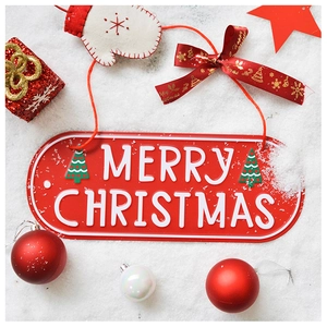 Detail of red Christmas welcome sign with white 3D Merry Christmas text on snow background