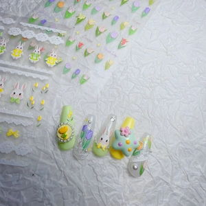 3D embossed nail stickers featuring cute cartoon rabbits and colorful tulips on white base
