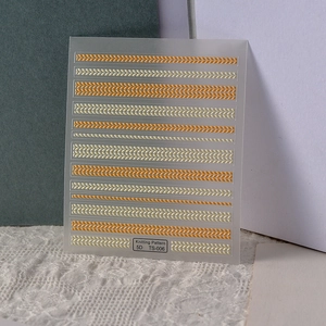 5D embossed nail stickers with orange and beige knitting patterns model TS-006