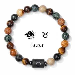 Detailed top view of Taurus natural stone bead bracelet with tiger eye and constellation charm