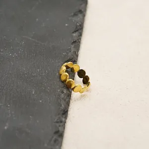 18K gold plated stainless steel open ring featuring a unique textured scallop shell design