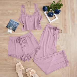 Ribbed three-piece lounge set with lace trim featuring camisole, shorts and long pants