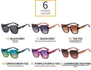 Detail of multi-color cat-eye sunglasses collection with golden V-logo on temples