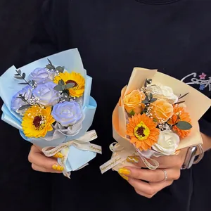 Handcrafted soap flower bouquet with artificial roses and sunflowers in elegant packaging