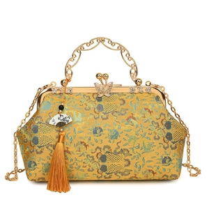 Yellow silk brocade shell handbag with koi pattern and butterfly metal handle