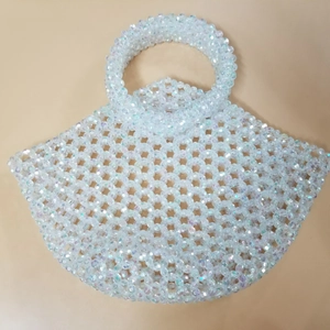 Handmade beaded scallop bag with iridescent clear pearls and unique integrated handle