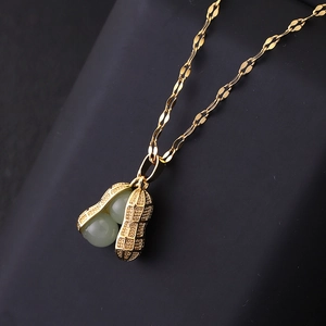 Titanium steel golden necklace with jade-style peanut pendant in a classic Chinese design