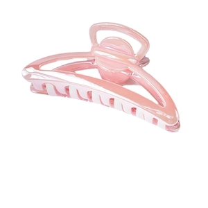 Pink holographic jellyfish hair claw clip with glossy finish on white background