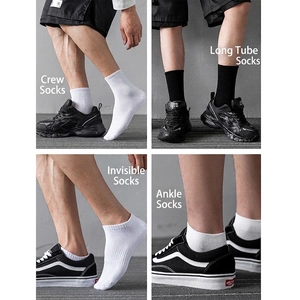 Classic cotton sports socks available in crew, ankle, boat, and low cut lengths in black and white