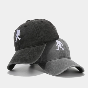 Vintage washed cotton baseball caps with yeti embroidery in black and dark grey