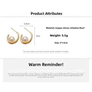 Detailed view of C-shaped pearl earrings with gold finish and zircon inlay measurements