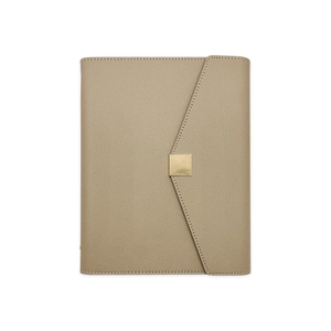 Close-up of khaki lychee texture leather notebook cover with a square gold metal clasp