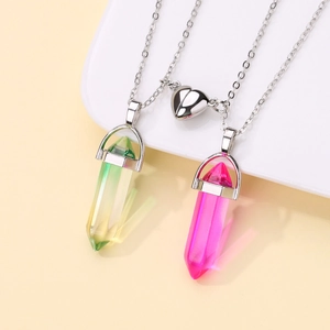 Close-up of magnetic heart clasp with hexagonal gradient stone pendants on chains