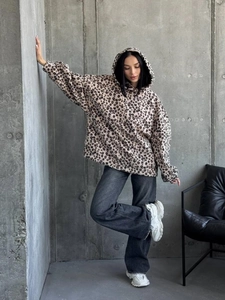 Oversized leopard print fleece hoodie for women with a warm polar fleece texture and hood