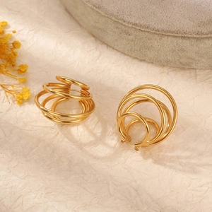Irregular multilayer gold hoop earrings in stainless steel with a minimalist design