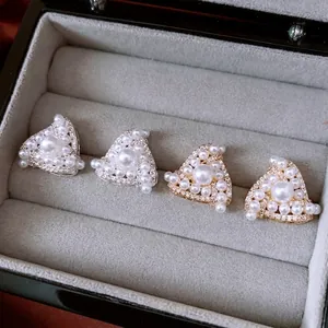 Elegant gold and silver plated triangle stud earrings with zircons and pearls