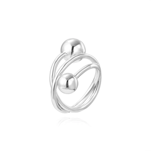 Macro shot of silver triple-layered spiral ring with metal bead ends on white background