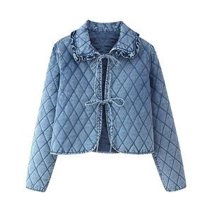 Women's blue quilted denim bomber jacket with ruffle collar and ribbon tie front