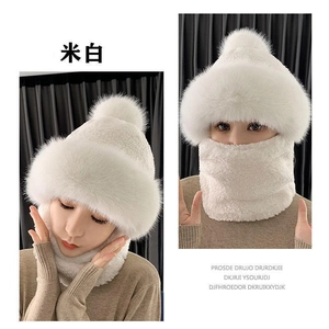 Detail of soft cream white faux fur knit hat and scarf set with fluffy pompom