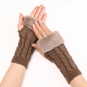 Detailed view of brown cable knit arm warmers with soft pink faux fur cuffs and fingerless design