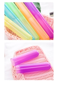 Five translucent portable plastic cases in vibrant colors for toothbrushes and travel gear