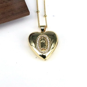 Vintage gold heart necklace with Virgin Mary pendant and crystals on a bead chain