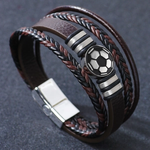 Fashionable multilayer braided leather soccer bracelet with metal charm on dark surface