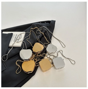 Mini metallic acrylic evening bags in gold and silver with elegant chain straps