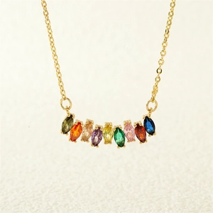 Macro view of multi-color marquise-cut zircon stones on a delicate gold-plated chain